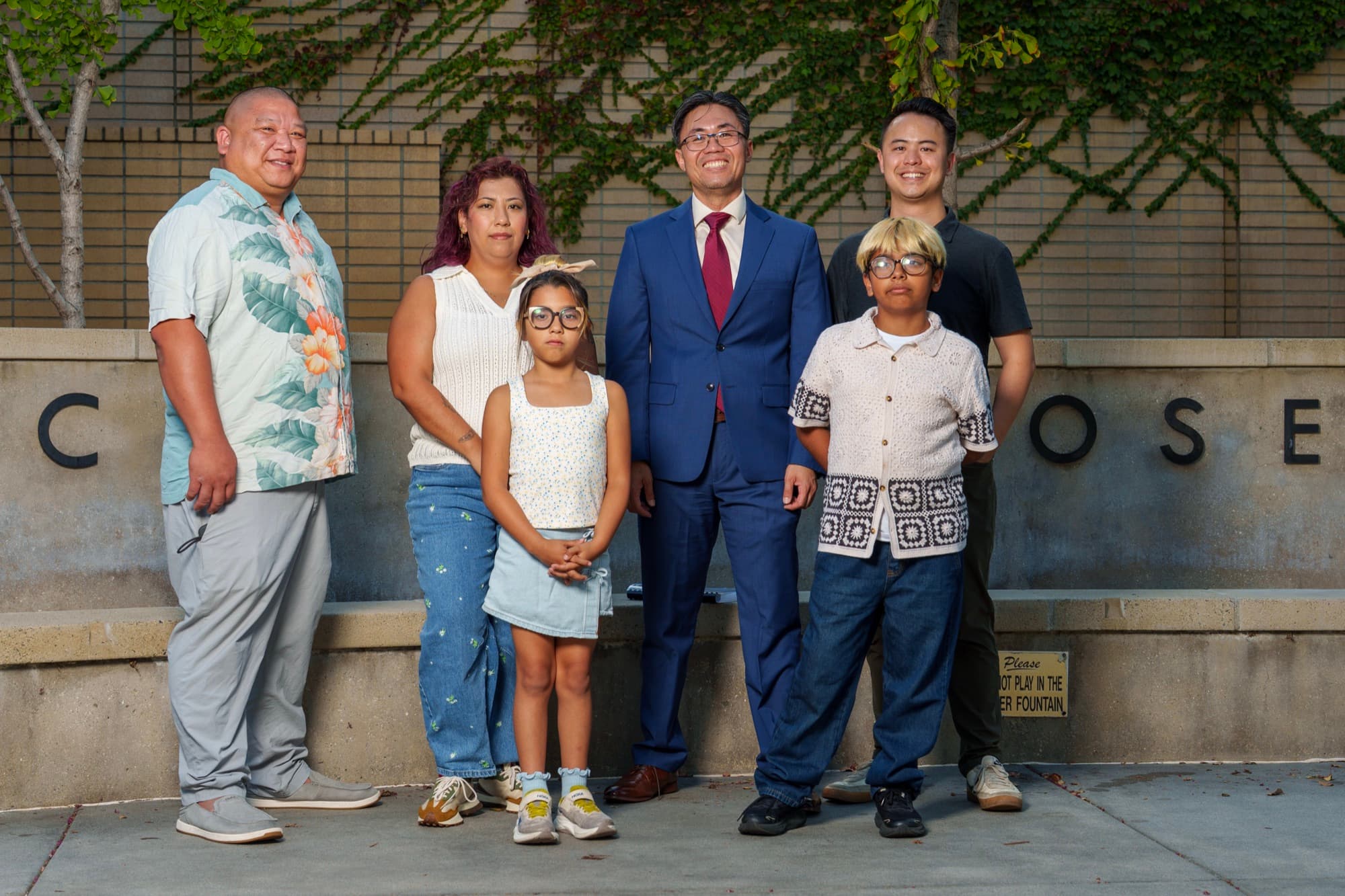 Steven Ly with a Rosemead family outside the Civic Center