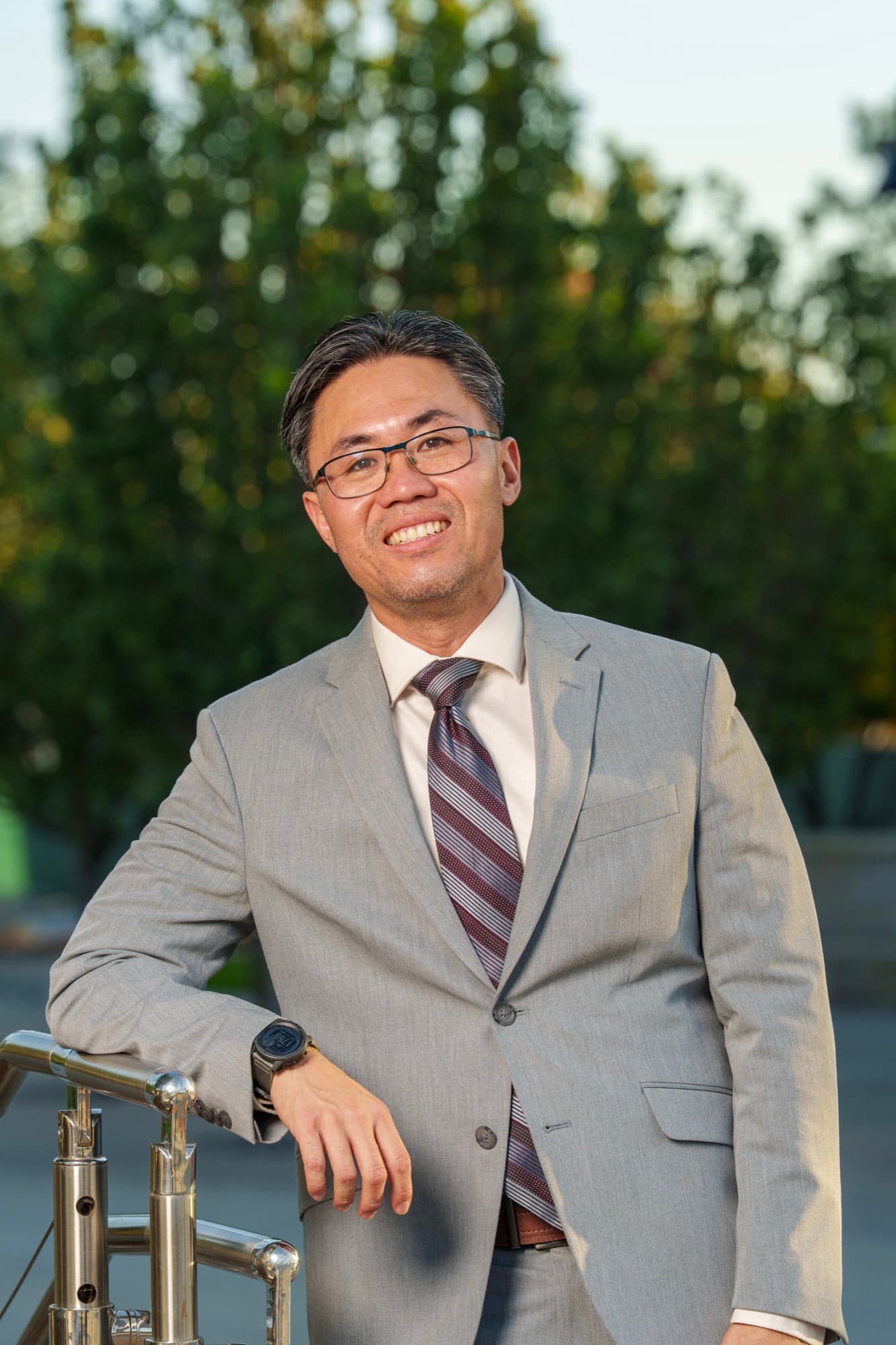 Steven Ly smiling outside the Rosemead Civic Center